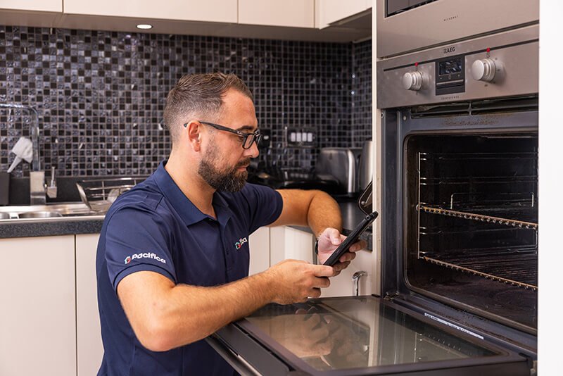 Pacifica engineer repairing oven - Domestic Appliance Repairs Kent - Autowash