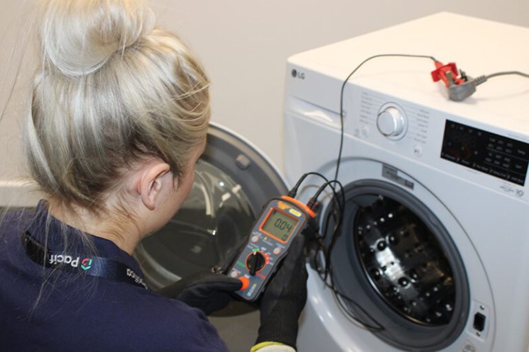 Pacifica engineer repairing a washing machine - Domestic Appliance Repairs WARRINGTON, WIDNES, ST HELENS - NWAS